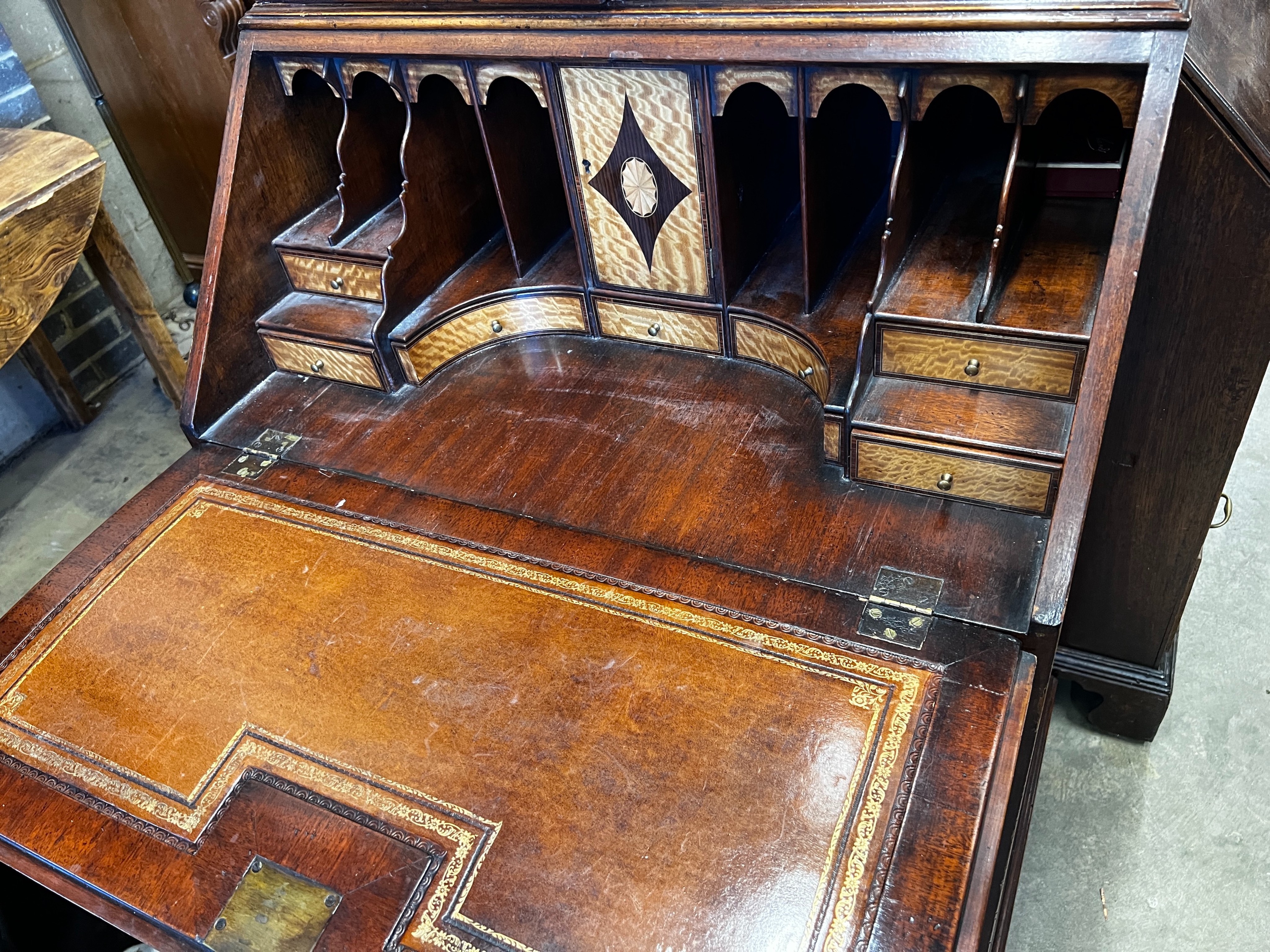 A George III style narrow mahogany bureau bookcase, width 75cm, depth 51cm, height 208cm